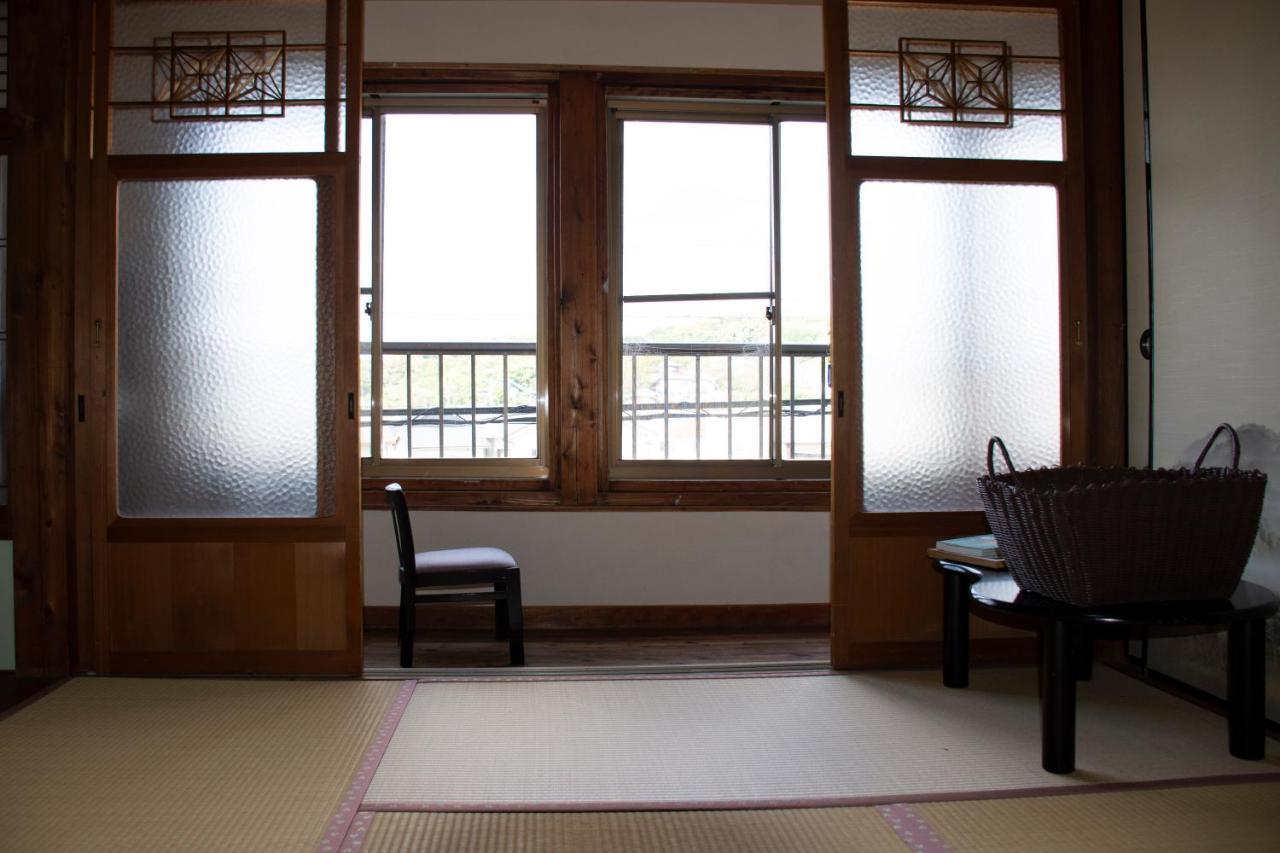 Guest Cafe Kuchikumano Hotel Kamitondacso Kültér fotó
